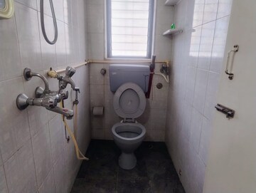 Bathroom in 2 BHK Apartment at Gracious CHS, Andheri East – for Rent