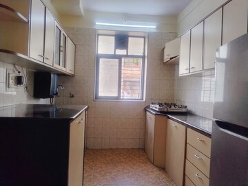 Kitchen in 2 BHK Apartment at Gracious CHS, Andheri East – for Rent