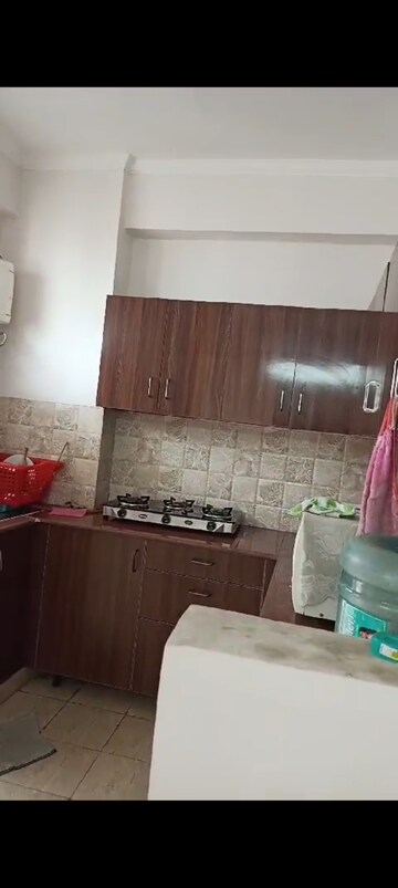 Kitchen in 2 BHK Apartment at Amrapali Golf Homes, Sector 4, Greater Noida – for Sale