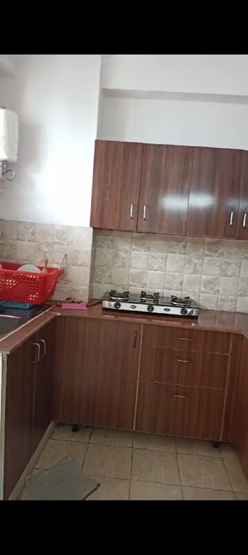 Kitchen in 2 BHK Apartment at Amrapali Golf Homes, Sector 4, Greater Noida – for Sale