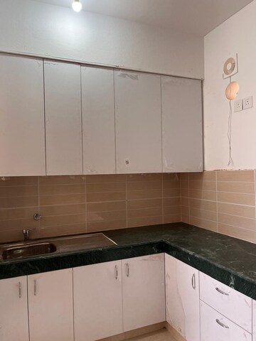 Kitchen in 4 BHK Builder Floor at BPTP Parkland Pride, Sector 77 – for Rent