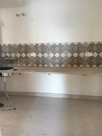 Kitchen in 2 BHK Apartment at Signature Orchard Avenue 2, Sector 93 – for Sale