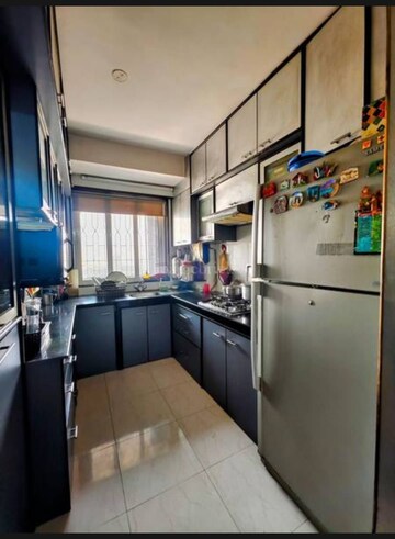 Kitchen in 2 BHK Apartment at Chandak Cornerstone, Worli – for Rent