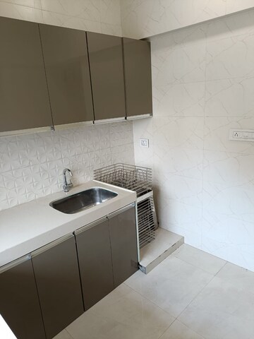 Kitchen in 1 BHK Apartment at Devika Towers, Collectors Colony – for Rent