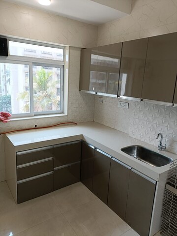 Kitchen in 1 BHK Apartment at Devika Towers, Collectors Colony – for Rent