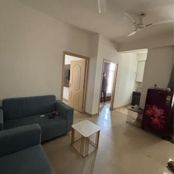 Living Room in 2 BHK Apartment at Shree Vardhman Mantra, Ramgarh Dhani – for Rent
