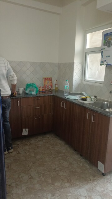 Kitchen in 2 BHK Apartment at Amrapali Terrace Homes, Tech Zone 4 Greater Noida – for Rent