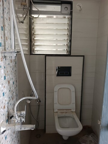 Bathroom in 2 BHK Apartment at Omkar Veda Exclusive, Parel – for Sale
