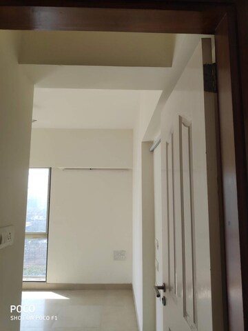 Building Lobby in 2 BHK Apartment at Aspen Park, Goregaon East – for Rent