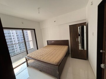 Bedroom in 2 BHK Apartment at Roshan Milestone, Tathawade – for Rent