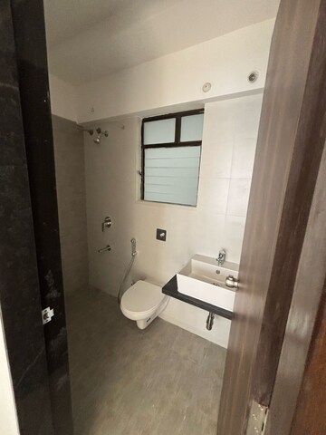 Bathroom in 2 BHK Apartment at Roshan Milestone, Tathawade – for Rent