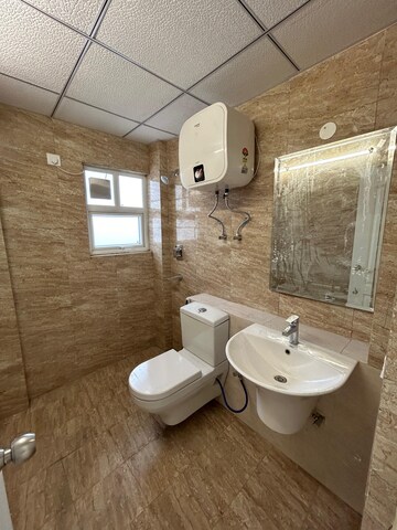 Bathroom in 4 BHK Apartment at DLF New Town Heights I, Sector 90 – for Rent