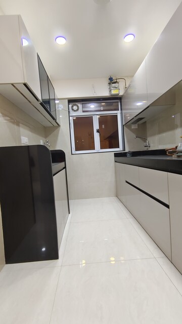 Kitchen in 2 BHK Apartment at Prime CHS, Mulund East – for Rent