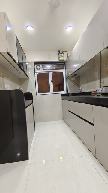 Kitchen in 2 BHK Apartment at Prime CHS, Mulund East – for Rent
