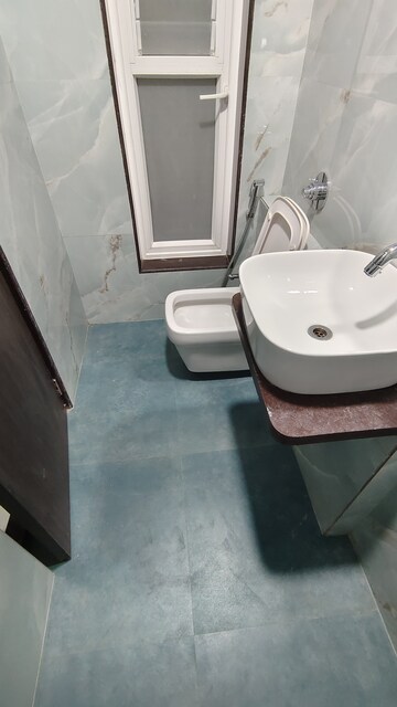 Bathroom in 2 BHK Apartment at Prime CHS, Mulund East – for Rent
