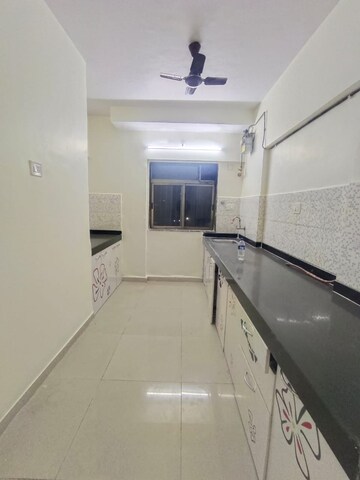 Kitchen in 2.5 BHK Apartment at Everest World Aspen, Dhokali – for Sale
