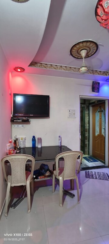 Living Room in 1 BHK Apartment at Bindra Complex, Andheri East – for Rent