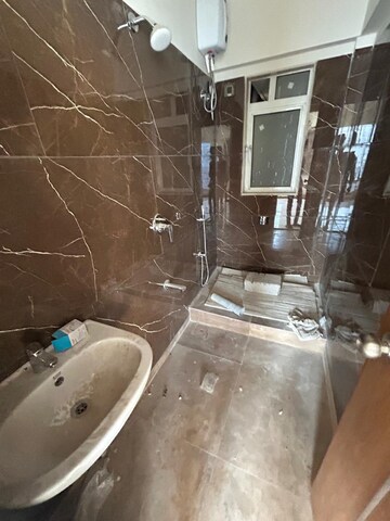 Bathroom in 4 BHK Apartment at Alag Aranya, Naidu Colony – for Rent