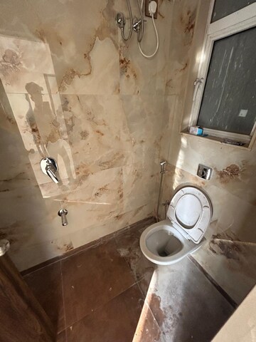 Bathroom in 4 BHK Apartment at Alag Aranya, Naidu Colony – for Rent