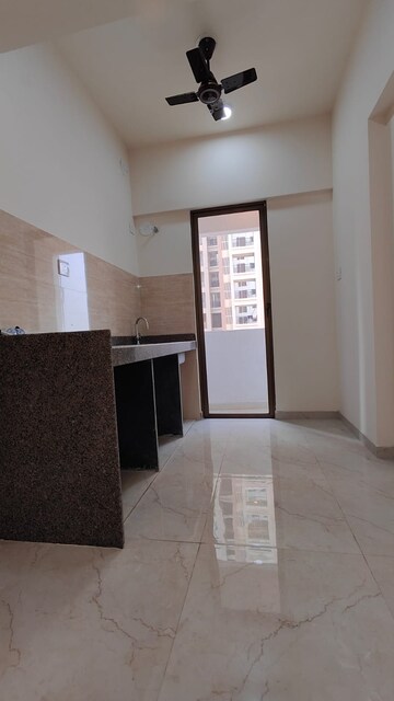 Kitchen in 2 BHK Apartment at Sunteck Maxxworld, Naigaon East – for Rent