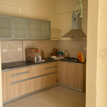 Kitchen in 2 BHK Apartment at Gera Song Of Joy, Kharadi – for Rent