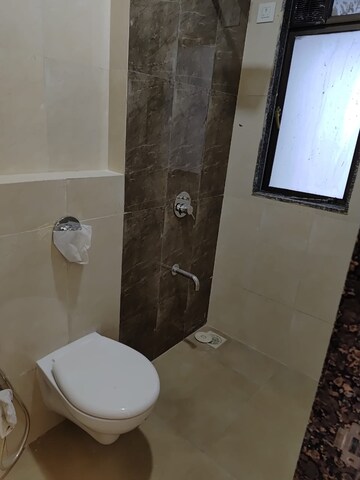 Bathroom in 2 BHK Apartment at Lotus Unity, Versova – for Rent