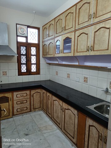 Kitchen in 2 BHK Builder Floor at Khirki Extension – for Rent