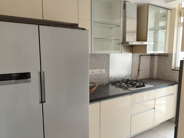 Kitchen in 4 BHK Apartment at Mahindra Luminare, Sector 59 – for Sale