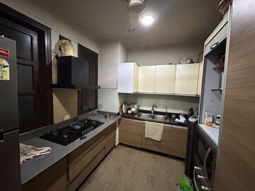 Kitchen in 3 BHK Apartment at Mahindra Luminare, Sector 59 – for Sale
