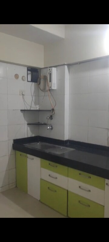 Kitchen in 2 BHK Apartment at Gokuldham Complex, Goregaon East – for Rent