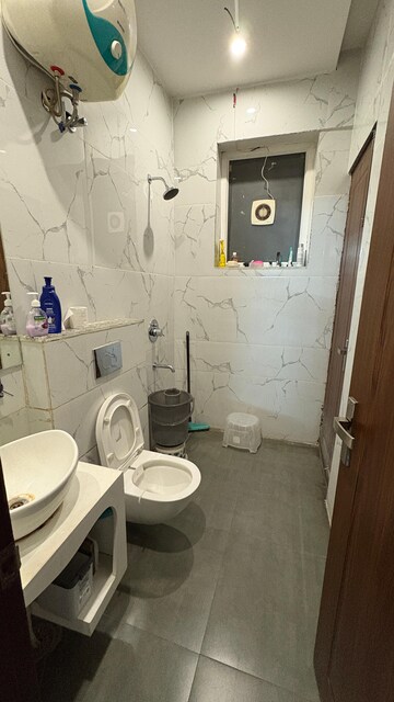 Bathroom in 3 BHK Builder Floor at Dhakoli Village – for Sale