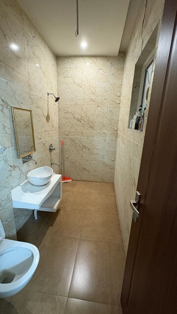 Bathroom in 3 BHK Builder Floor at Dhakoli Village – for Sale