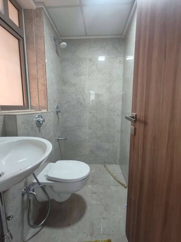 Bathroom in 1 BHK Apartment at Sheth Irene, Malad West – for Rent