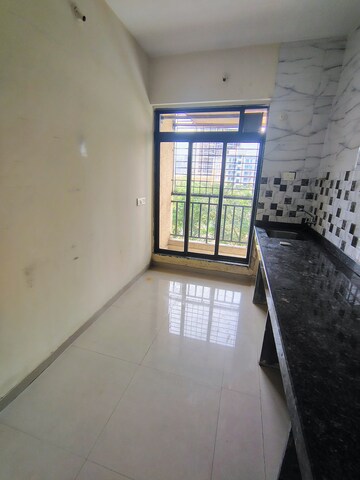 Kitchen in 2 BHK Apartment at Golden Tower, Sector 24 Taloja – for Rent