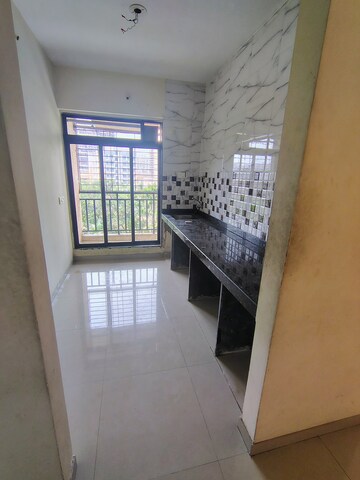 Kitchen in 2 BHK Apartment at Golden Tower, Sector 24 Taloja – for Rent