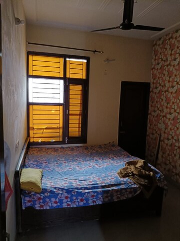 Bedroom in 2 BHK Builder Floor at Dhakoli Village – for Sale