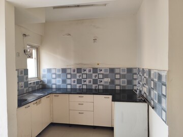 Kitchen in 2.5 BHK Apartment at Aims Golf Avenue I, Sector 75 – for Rent