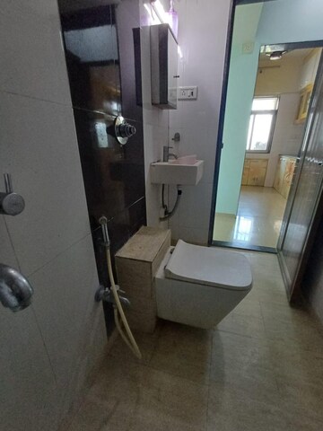 Bathroom in 1 BHK Apartment at Vihang Valley Phase 2, Kasarvadavali – for Rent