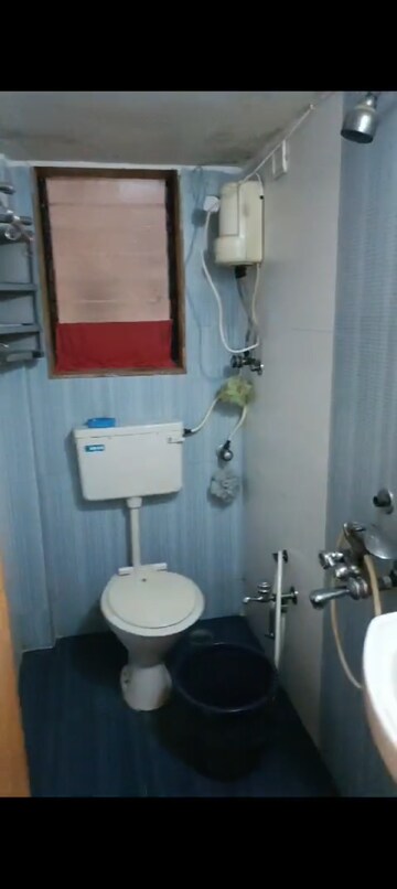Bathroom in 2 BHK Apartment at Umang Shastri Nagar West View CHS, Goregaon West – for Rent