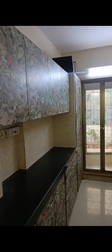 Kitchen in 2 BHK Apartment at Umang Shastri Nagar West View CHS, Goregaon West – for Rent
