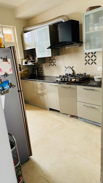 Kitchen in 3 BHK Apartment at Adani Oyster Grande Phase 2, Sector 102 – for Rent