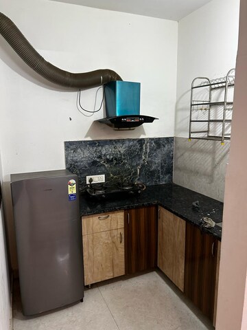 Kitchen in Studio Builder Floor at Sector 45 – for Rent