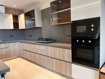Kitchen in 3 BHK Apartment at Sunworld Arista, Sector 168 – for Sale