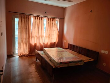 Bedroom in 3 BHK Builder Floor at Dhakoli Village – for Sale