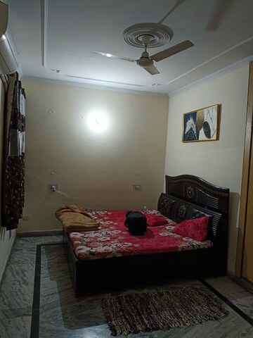 Bedroom in 3 BHK Builder Floor at Dhakoli Village – for Sale