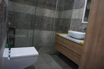 Bathroom in 4 BHK Apartment at Vasant Kunj – for Rent