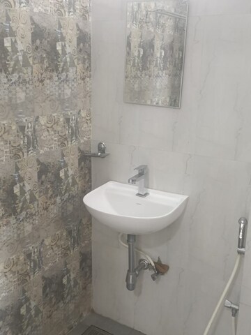 Bathroom in 2 BHK Apartment at Godshalwar Sky Lark, Vile Parle West – for Rent