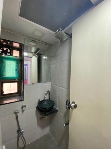 Bathroom in 2 BHK Apartment at Vile Parle West – for Rent
