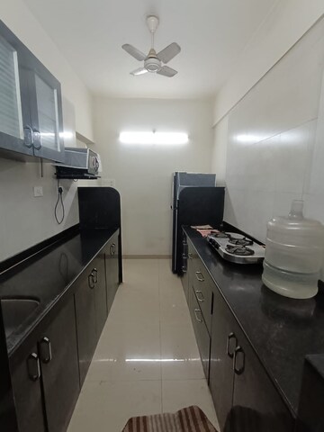 Kitchen in 1.5 BHK Apartment at Dheeraj Jade Residences, Wagholi – for Rent