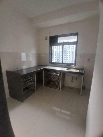 Kitchen in 2 BHK Apartment at Runwal Eirene, Balkum Pada – for Rent